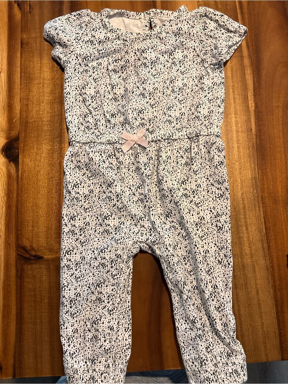 Simple White Speckled Romper with Pink Bow